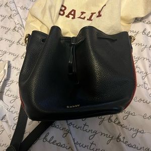 Bally bag lightly worn duster bag included .. size small /medium fits full size